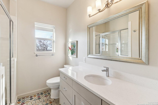 bathroom with toilet, a shower with door, and vanity