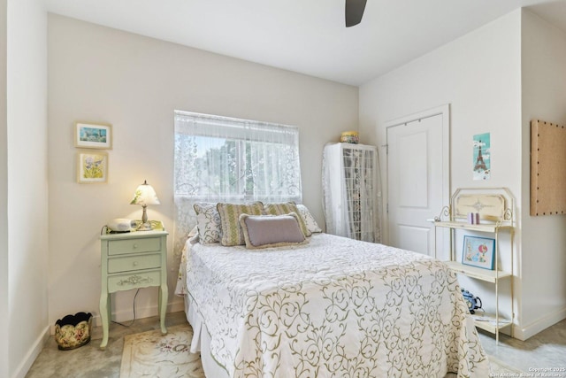 bedroom with light carpet and ceiling fan