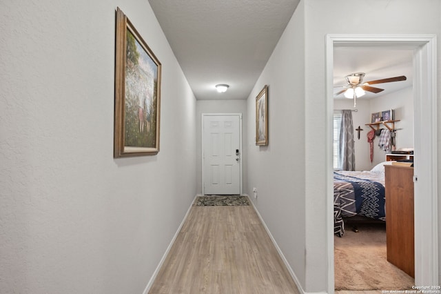 hallway featuring light wood-type flooring