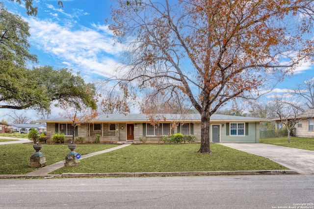 ranch-style house with a front yard