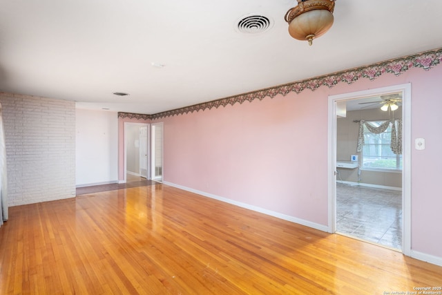 empty room featuring light wood-type flooring