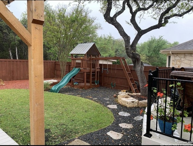 view of play area featuring a lawn