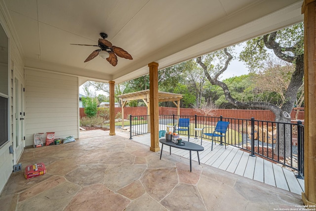 view of patio featuring a pergola and ceiling fan