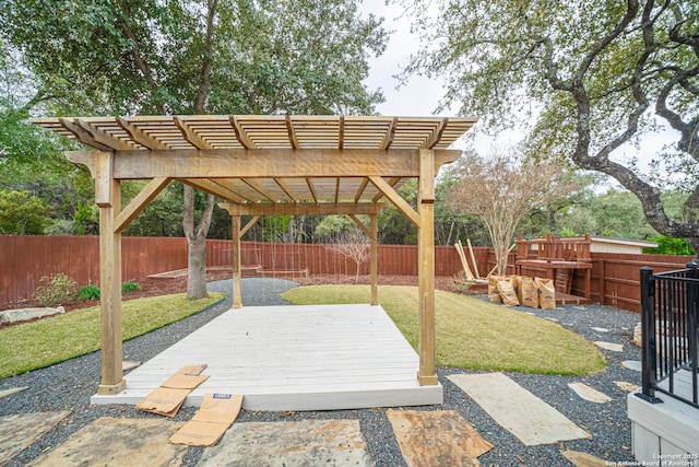 view of patio featuring a wooden deck and a pergola