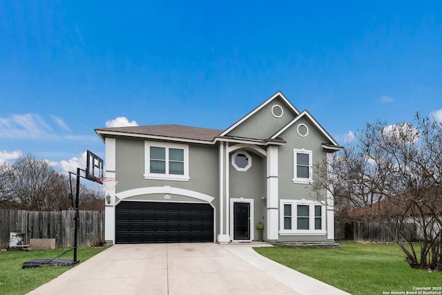 view of front property featuring a front yard and a garage