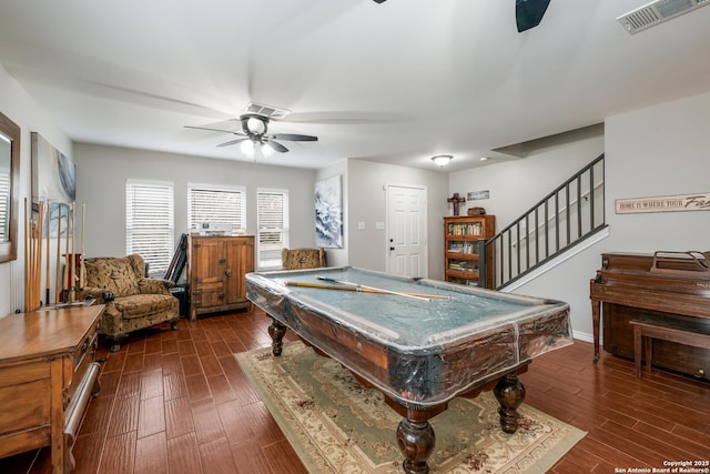 recreation room featuring billiards, ceiling fan, and dark wood-type flooring