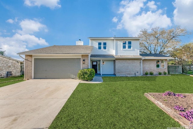 view of front of house featuring a front lawn and a garage