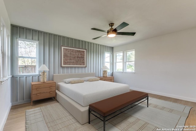 bedroom featuring ceiling fan and light wood-type flooring