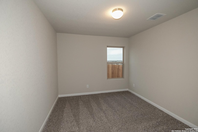 view of carpeted spare room