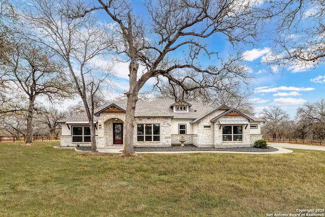 view of front of home with a front yard