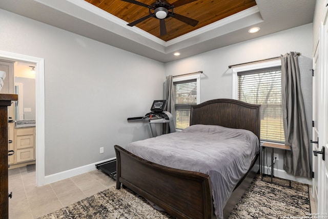 tiled bedroom featuring ensuite bath, a raised ceiling, wood ceiling, crown molding, and ceiling fan