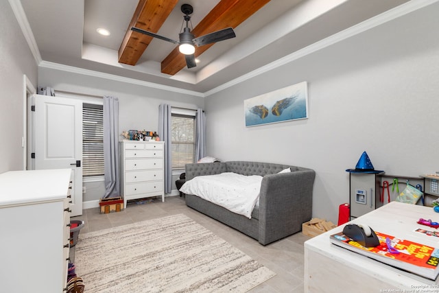 bedroom featuring crown molding, ceiling fan, and a tray ceiling