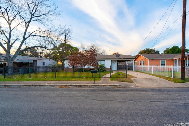 view of front of property featuring a carport