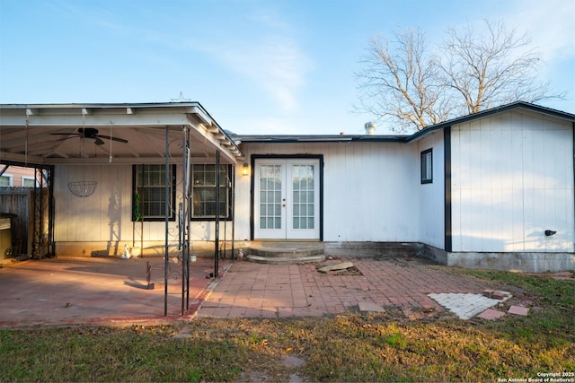 back of property featuring french doors, a patio area, and ceiling fan