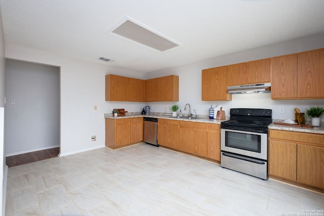 kitchen featuring appliances with stainless steel finishes and sink