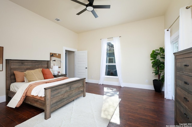 bedroom featuring dark wood-type flooring and ceiling fan