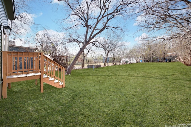 view of yard featuring a deck