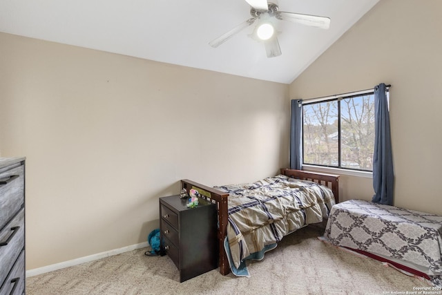 carpeted bedroom featuring ceiling fan and vaulted ceiling