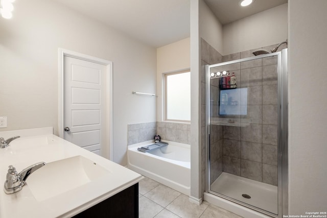 bathroom with separate shower and tub, tile patterned flooring, and vanity