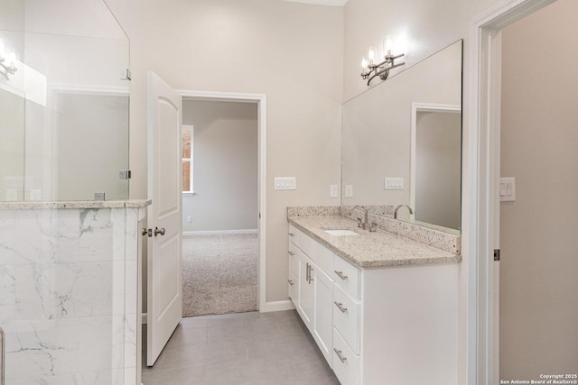 bathroom featuring vanity and tile patterned flooring