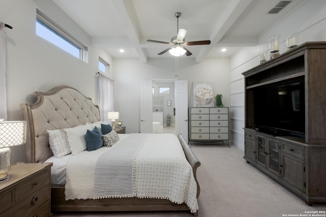 carpeted bedroom featuring beamed ceiling, ceiling fan, coffered ceiling, and ensuite bath