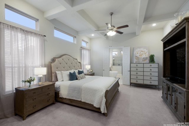 bedroom featuring ensuite bathroom, coffered ceiling, light carpet, beamed ceiling, and ceiling fan