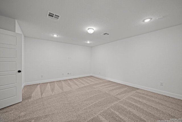 9314 Everly Crk, San Antonio, TX 78263 - empty room featuring baseboards, visible vents, recessed lighting, and light colored carpet