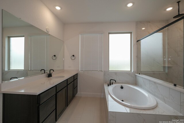 9314 Everly Crk, San Antonio, TX 78263 - bathroom featuring vanity, recessed lighting, baseboards, a garden tub, and tiled shower