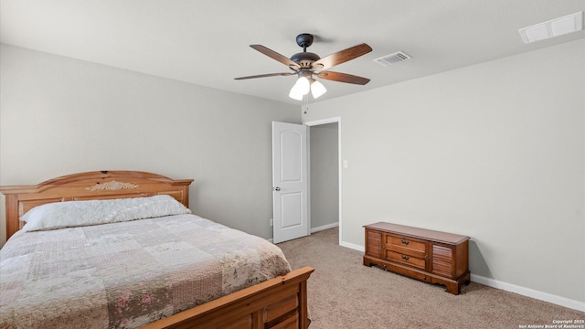 bedroom featuring ceiling fan and light colored carpet