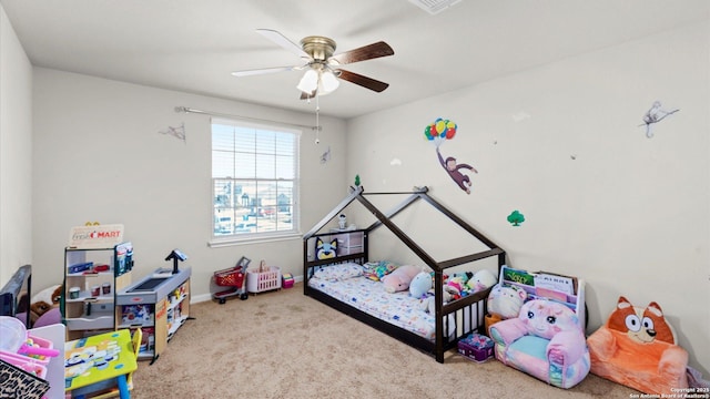 carpeted bedroom featuring ceiling fan