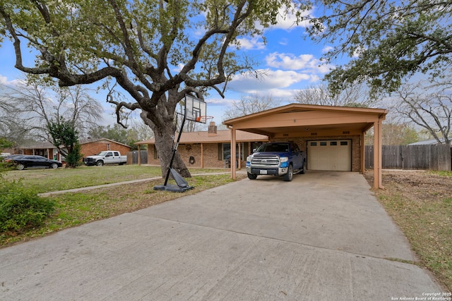 single story home with a front yard and a carport