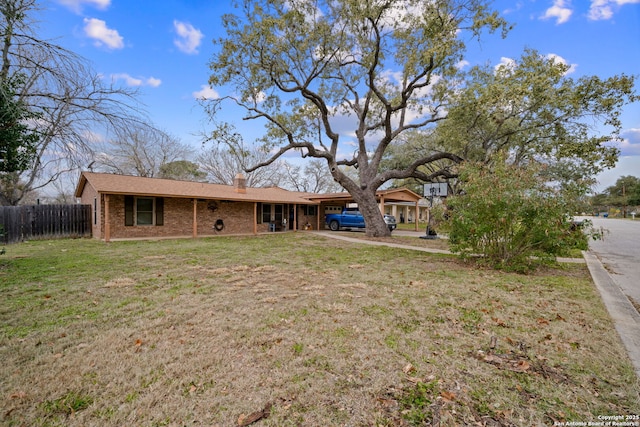 exterior space featuring a front yard