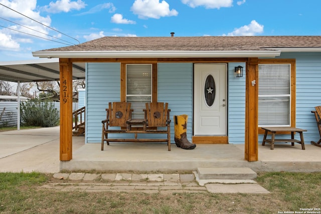 doorway to property with a porch