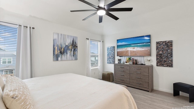 bedroom featuring ceiling fan and light hardwood / wood-style floors