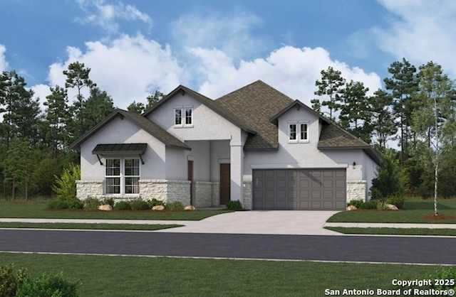 view of front of home featuring a front lawn and a garage