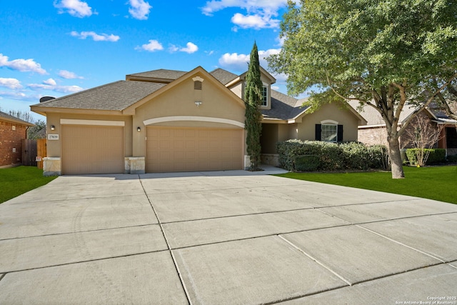 single story home with a front lawn and a garage