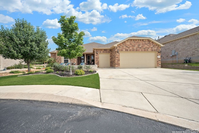 single story home with a front yard and a garage