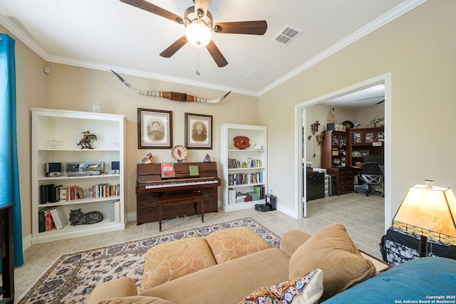 tiled living room with ornamental molding and ceiling fan