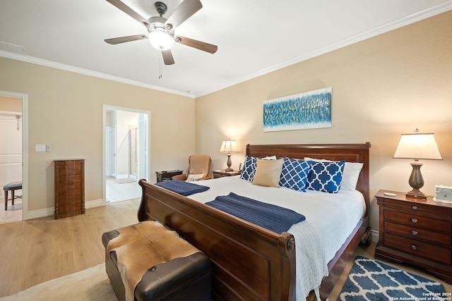 bedroom with ensuite bathroom, ceiling fan, light wood-type flooring, and ornamental molding