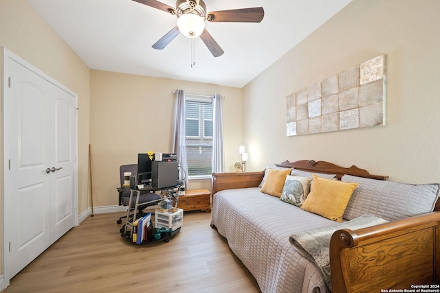 bedroom featuring ceiling fan and light wood-type flooring