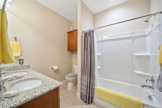 full bathroom featuring toilet, vanity, and shower / bath combo with shower curtain