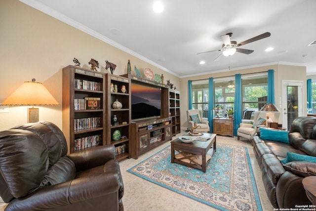 living room with light tile patterned flooring, ornamental molding, and ceiling fan