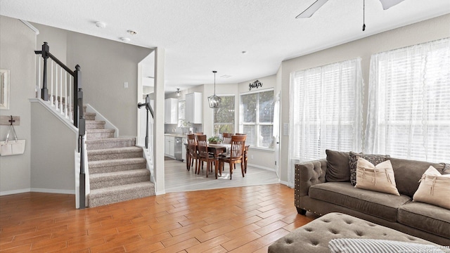 living room with ceiling fan