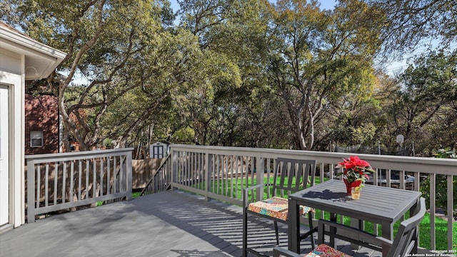 deck featuring a storage shed