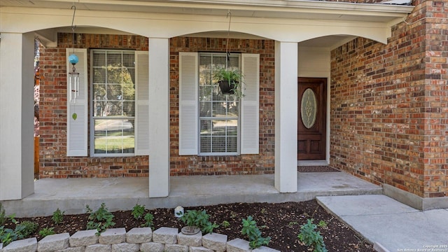 property entrance with a porch