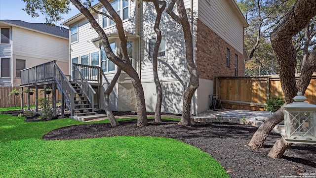 view of yard with a deck