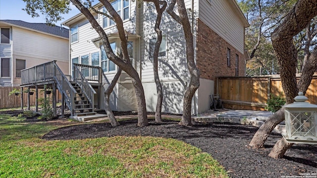 view of yard featuring a deck