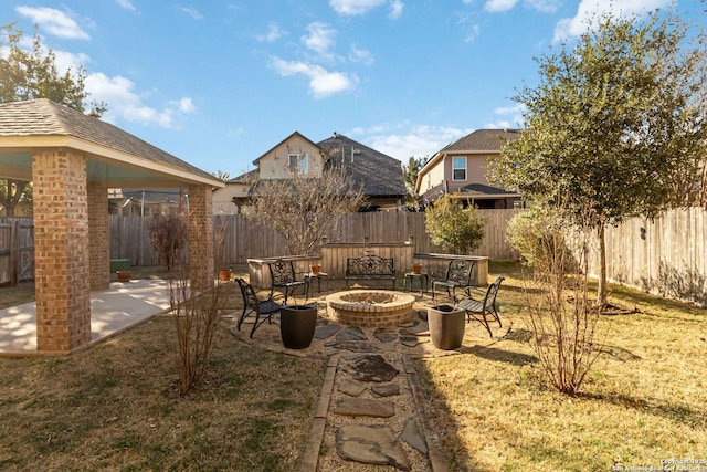 view of yard featuring a gazebo, an outdoor fire pit, and a patio