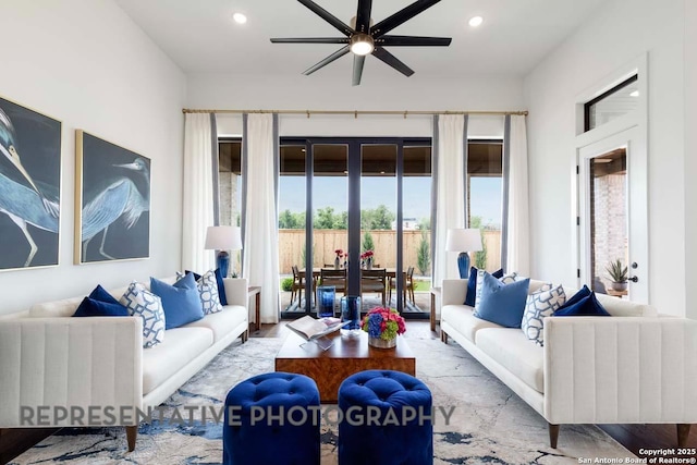 living room featuring ceiling fan