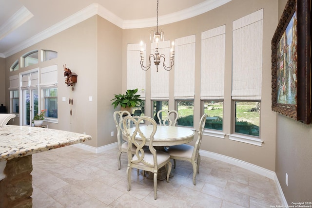 dining room with crown molding and a chandelier